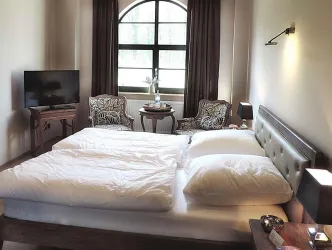 Gästezimmer im Hofgut Holzmühle (© Hofgut Holzmühle, Westheim)