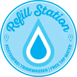 Ein Symbol für eine Wasserauffüllstation. Es zeigt, dass kostenloses Trinkwasser erhältlich ist.