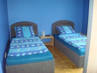Ferienwohnung Deutsch - Schlafbereich
