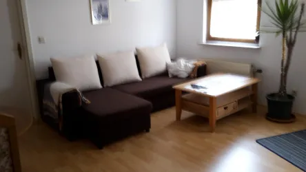 Ecksofa im Wohnzimmer (© Ferienwohnung Fam. Lutz)